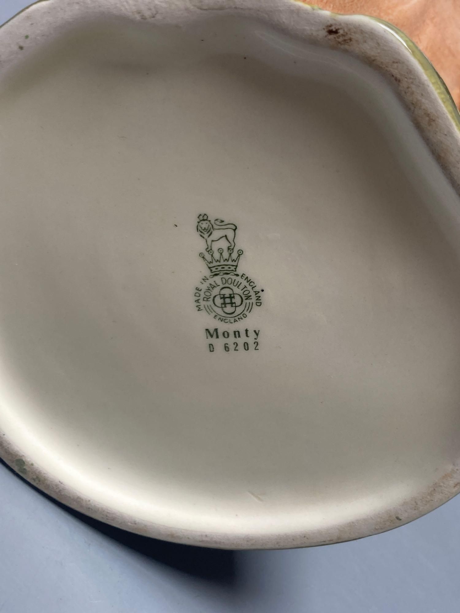 A Royal Doulton Lord Nelson character jug, Royal Doulton Monty character jug